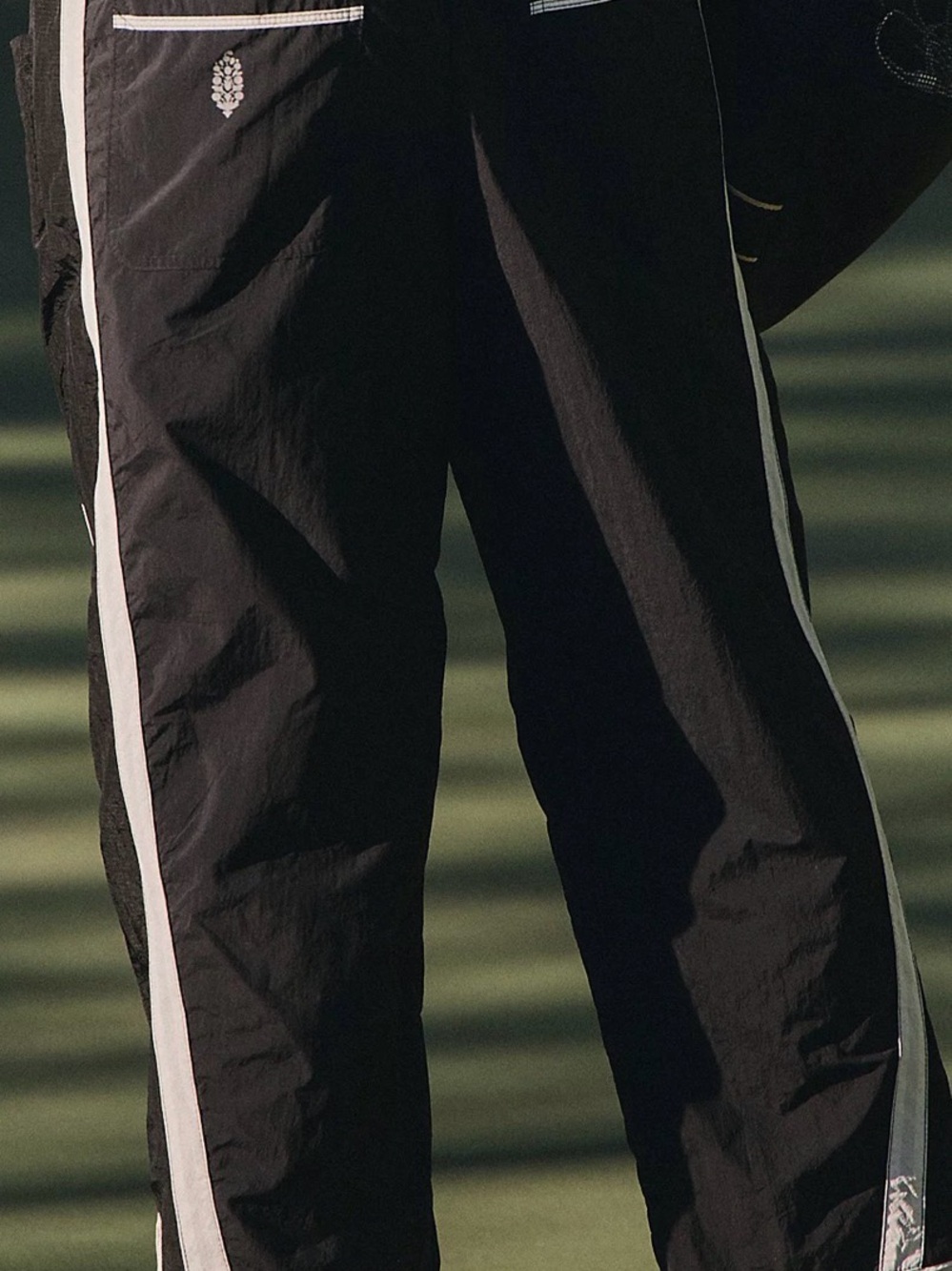 FP Movement ‘Champ is Here’ Black Track Pants with White Side Stripes - Picture 6 of 6